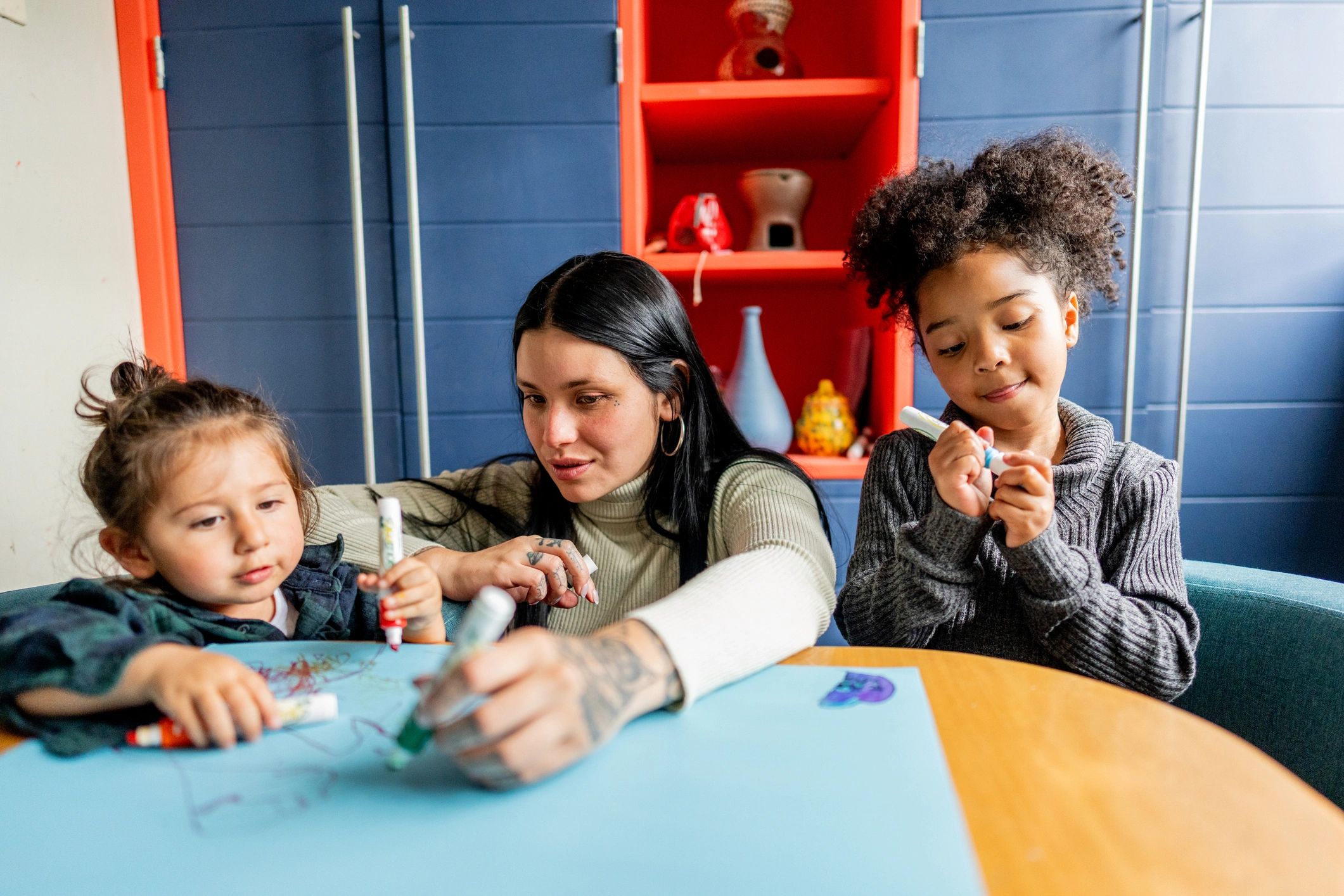 Parent helping children learn at home